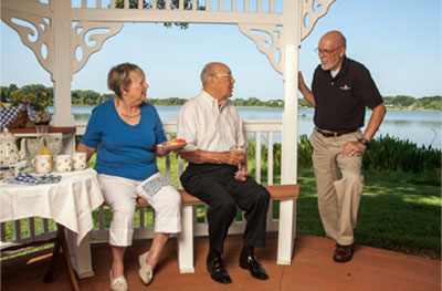 Residents outside in a gazebo